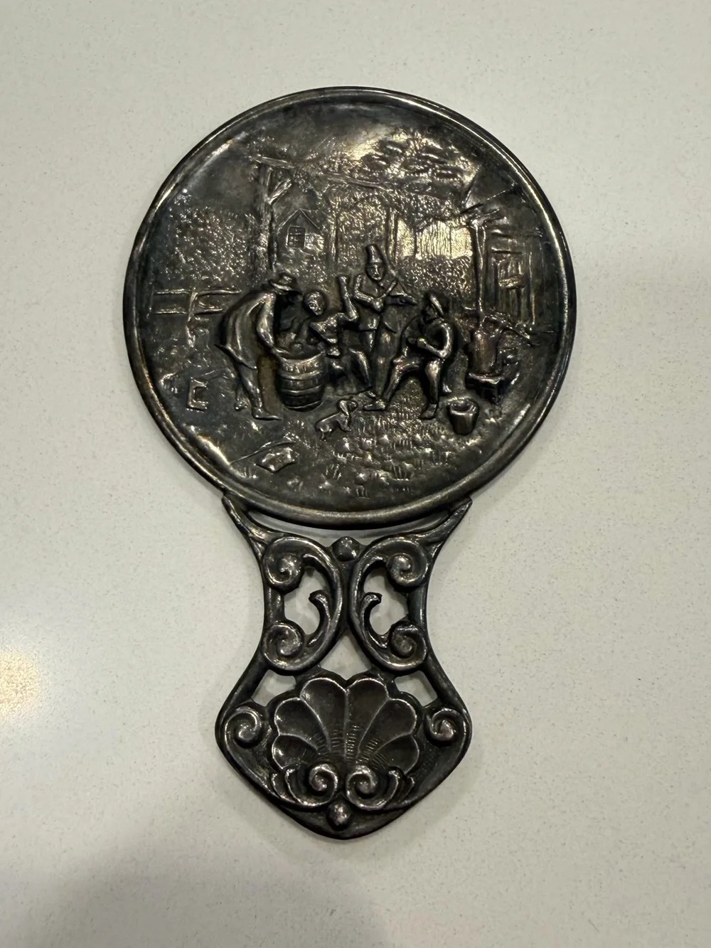 Vintage Silver-Tone Figural Hand Mirror with Tavern Scene